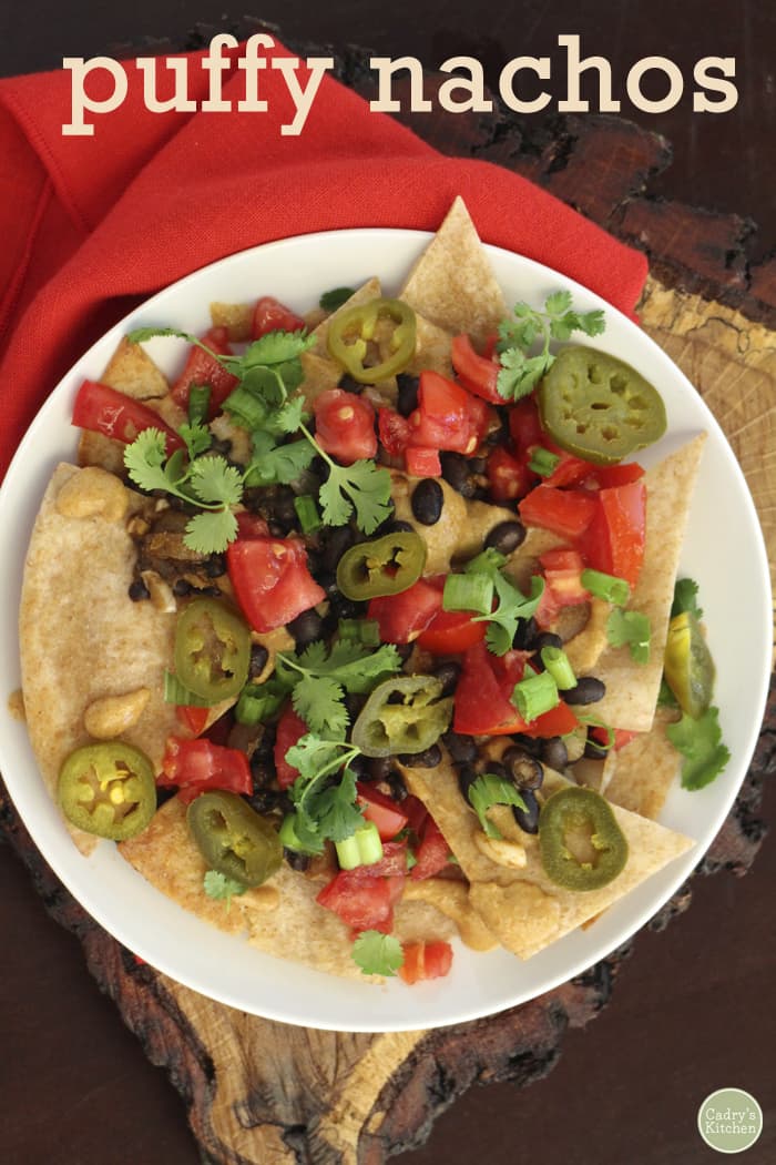 Puffy vegan nachos with spicy black beans