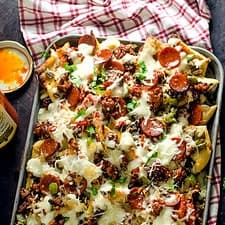 Loaded Pizza Nachos with Creamy Garlic White Sauce