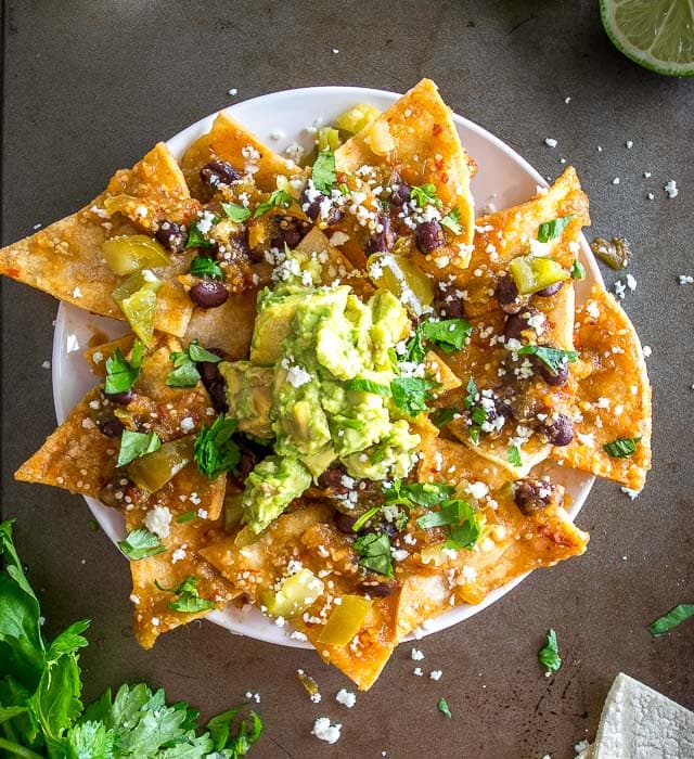 Chilaquiles With Black Beans, Avocado, and Pickled Jalapenos