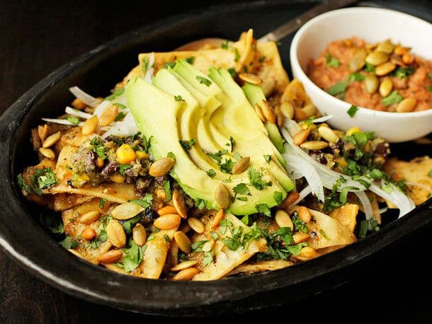 Chilaquiles With Pepitas, Charred Corn, and Black Beans Recipe